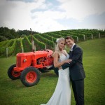Bridal-couple-with-little-red-tractor