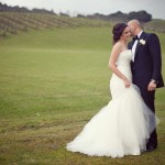 Wedding-couple-in-front-of-vines