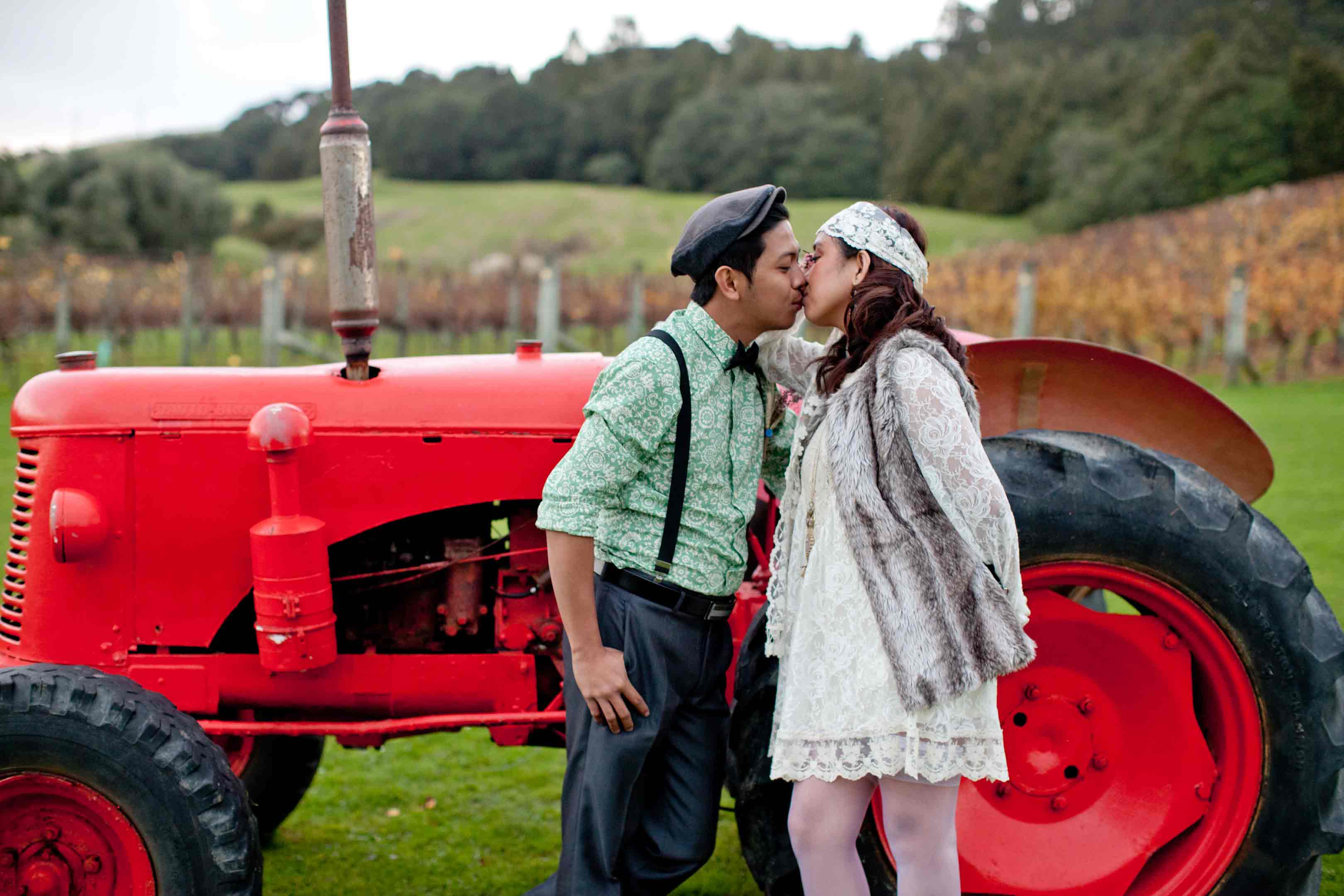 autumn-shot-with-bride-and-groom-and-little-red-tractor