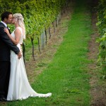 bridal-couple-embracing-in-the-vines