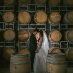 bridal-couple-with-barrel-wall