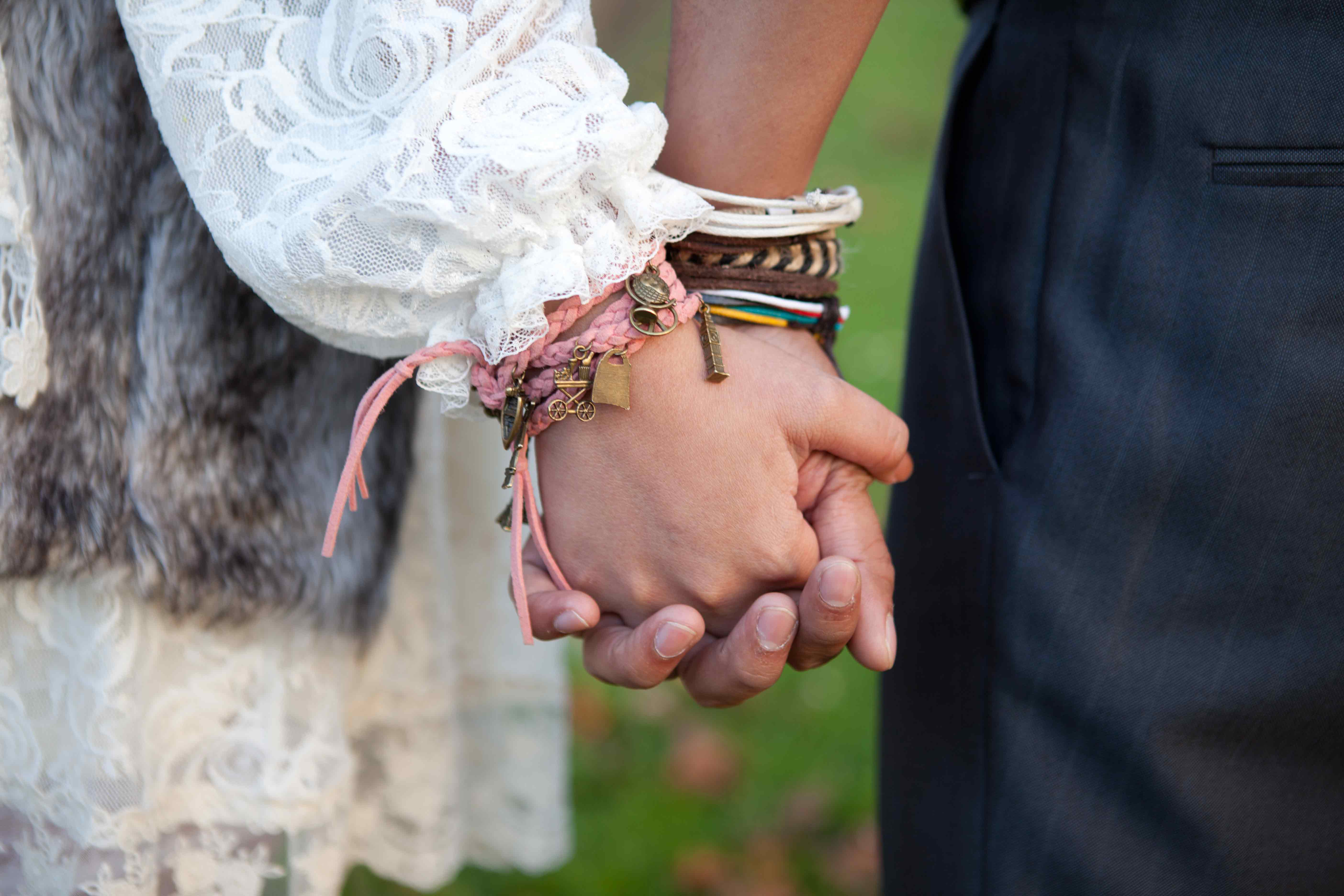 bride-and-groom-holding-hands
