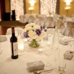 table-set-up-with-fairylights-behind